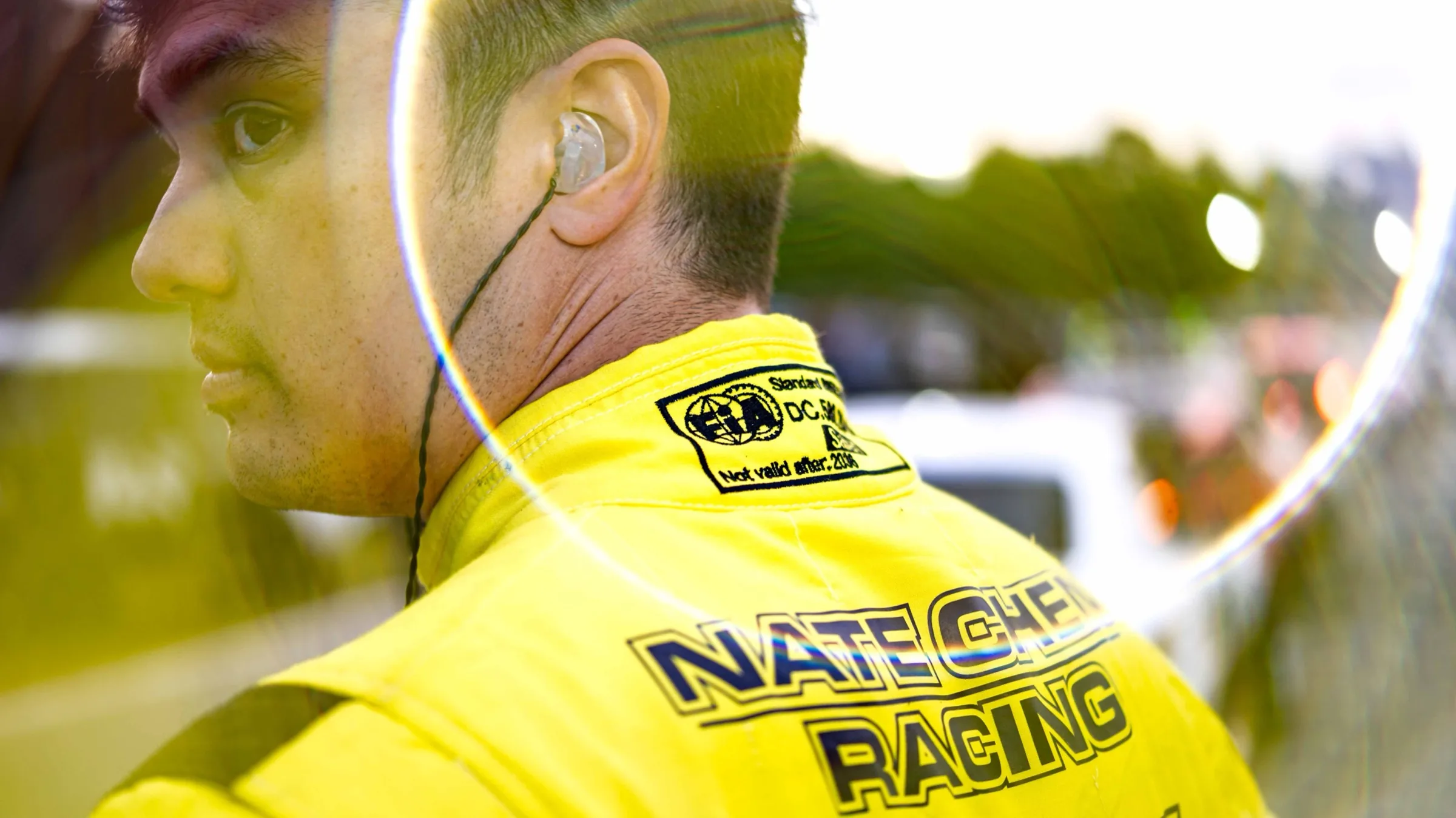 Backlit racing driver portrait
